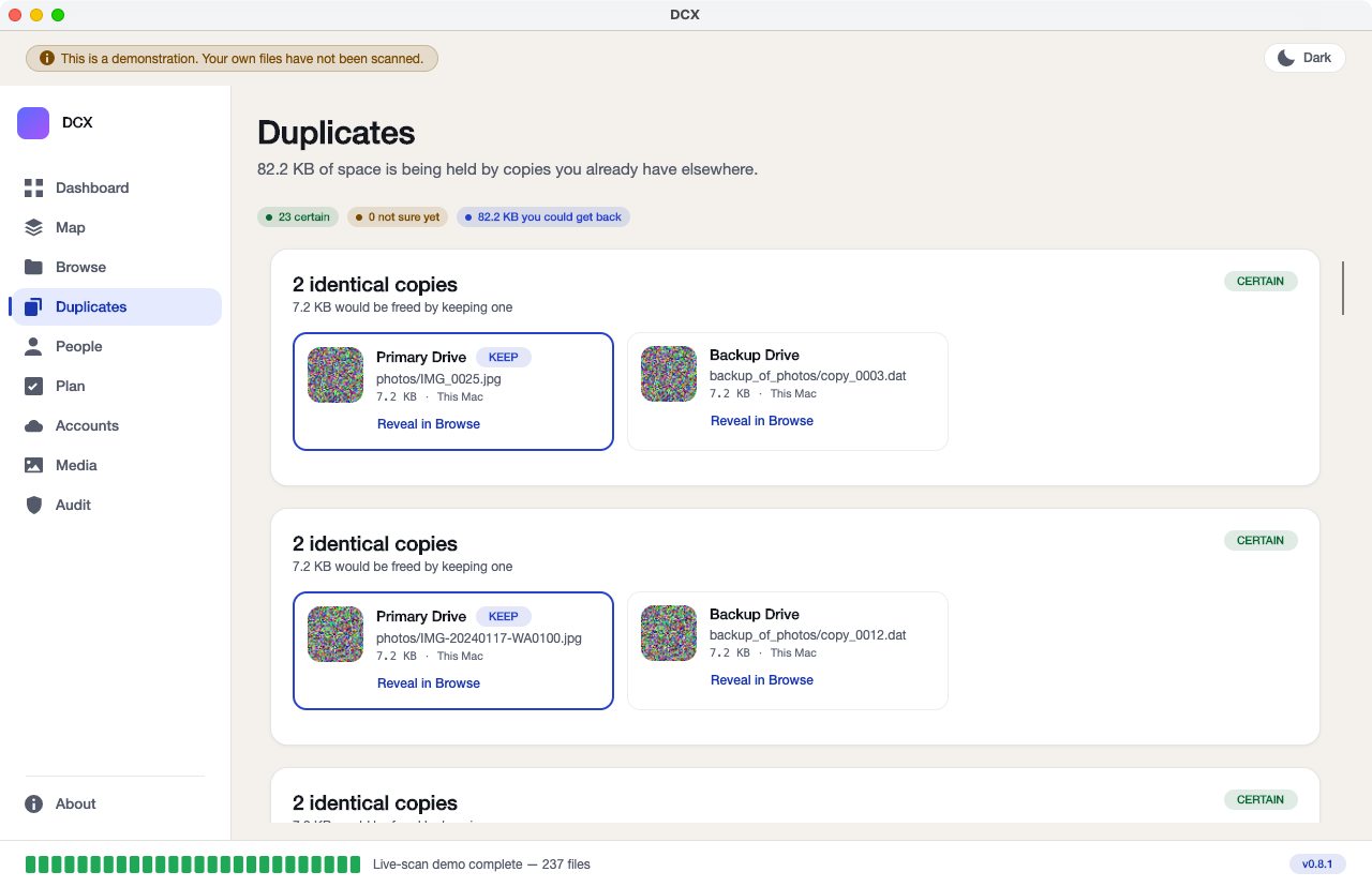 The Duplicates screen showing identical copies side by side with their pictures, one marked KEEP.